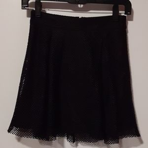 Black fish net skater mini skirt